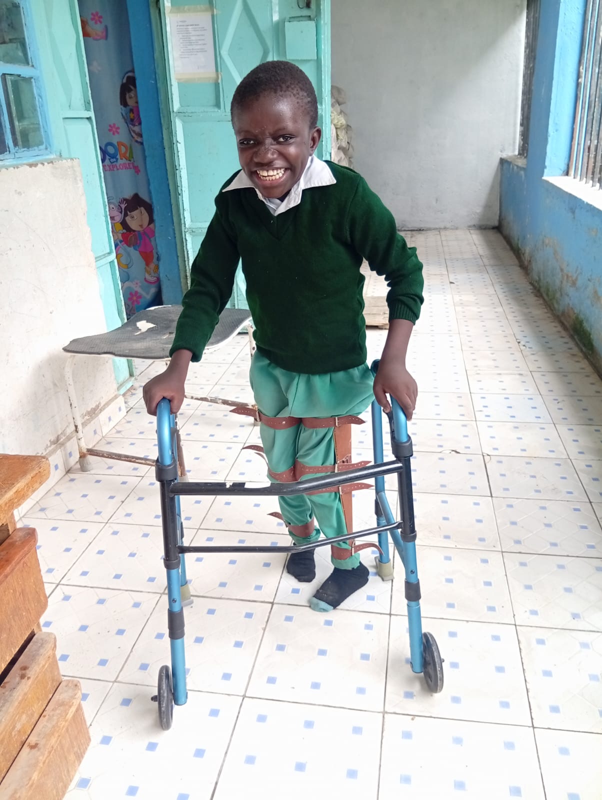 Beneficiary using a walker during therapy