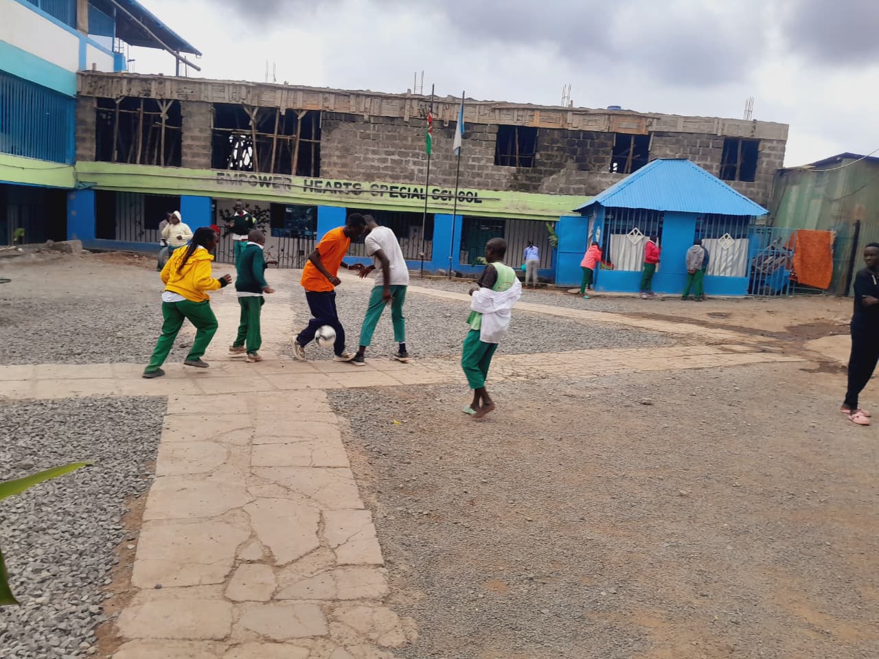 Students playing football at CHDF