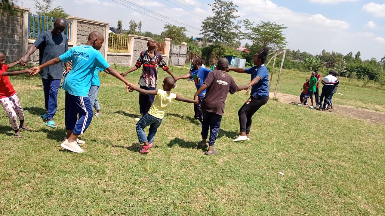 Children playing together at CHDF